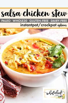 a white bowl filled with chicken stew on top of a table