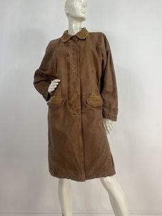 Brandon Thomas jacket, vintage Brandon Thomas coat, women's size small, would also fit medium, please verify exact measurements below  Measurements:  Shoulder 18"-19"/sleeve 22"/bust (pit-pit)24"/waist 22"/hip 22.5"/length 39.5" Mannequin measurements:  5'8", bust 34", waist 25", hip 33" Please note that vintage clothing sizes can vary greatly.  The Measurements provided  are approximate and are taken lying flat.  I suggest taking a similar garment from your wardrobe and measure it while lying f Vintage Brown Long Sleeve Outerwear For Fall, Brown Cotton Long Coat, Vintage Brown Long Sleeve Outerwear For Winter, Vintage Oversized Outerwear With Pockets, Vintage Brown Single Breasted Outerwear With Long Sleeves, Vintage Brown Single Breasted Long Sleeve Outerwear, Vintage Brown Outerwear With Button Closure And Long Sleeves, Vintage Brown Single-breasted Long Sleeve Outerwear, Vintage Brown Long Coat