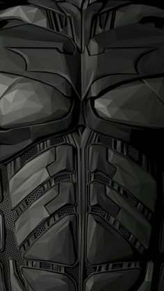 an abstract black and white photo of the back end of a motorcycle jacket with large vents