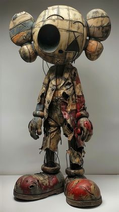 a sculpture made out of old shoes and equipment