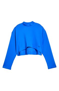 An oversized mock-neck sweatshirt features moisture-wicking Dri-FIT techology that keeps you comfy, while a cropped length creates a cool, modern look. 15 1/2" front length; 18" back length (size Medium) Mock neck 93% polyester, 7% spandex Machine wash, tumble dry Imported Athleisure High Neck Tops With Ribbed Cuffs, Moisture-wicking Functional Sweatshirt For Fall, Functional Moisture-wicking Sweatshirt For Fall, Athleisure Turtleneck Top With Ribbed Cuffs, Oversized Functional Sweatshirt For Fall, Nike Workout Tops With Ribbed Cuffs, Sporty Workout Tops With Funnel Neck, Fall Sportswear Funnel Neck Tops, Athleisure Funnel Neck Sweatshirt For Layering