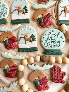 decorated cookies are arranged on a table