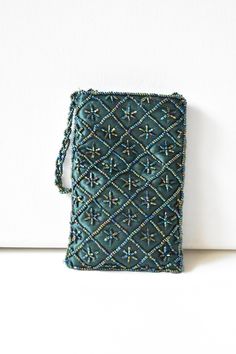 "Beaded green crossbody a gorgeous bag. handle 50\" long bag measures when 5 1/2\" x 3 1/2\"" Green Crossbody Evening Bag For Party, Beaded Rectangular Phone Bag For Parties, Rectangular Beaded Phone Bag For Parties, Evening Green Shoulder Bag With Mobile Phone Pocket, Green Evening Shoulder Bag With Phone Pocket, Party Beaded Rectangular Phone Bag, Party Rectangular Beaded Phone Bag, Green Crossbody Evening Bag With Phone Pocket, Green Crossbody Evening Bag For Mobile Phone