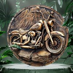 a wooden plaque depicting a gold motorcycle on a rock surrounded by plants and foliages