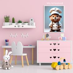 a room with pink walls and furniture, including a teddy bear wearing a chef's hat