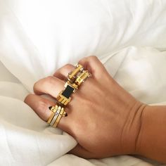 Metal movement. The One Finger Two Finger Ring features three geometric pieces with a precious stone fastening them together form one elegant ring or two with a simple flip of the finger. Pair with the Big Block Ring for a bold gemstone statement or the Hinge Ring for an industrial touch. Tap now to shop! #Minimalistic #Simple #Chic #Elegant #Luxury #Modern #nyc #Fashion #Classy #Trendy #Jewelry #angle #rings #collections #new #style #accessories #silver #gold  #gift #design #gemstone Modern Everyday Rings With Rectangular Stone, Modern Everyday Ring With Rectangular Stone, Modern Gold Stackable Gemstone Rings, Modern Gold Stackable Rings With Gemstones, Modern Stackable Gold Rings With Gemstones, Modern Stackable Jewelry, Modern Everyday Stackable Gemstone Rings, Modern Gemstone Stackable Rings For Everyday, Modern Onyx Ring Gift