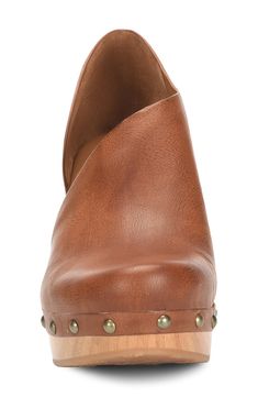 A half d'Orsay upper adds unique style to this 60s inspired clog. 2.5" heel, 1" platform Round toe Stud details Slip-on Wood heel Manmade upper and sole Imported Wood Heel, Women's Pumps, Nordstrom Rack, Clogs, Unique Style, Slip On, Nordstrom, Size 10, Pumps