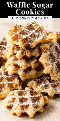 a stack of waffles with powdered sugar on top and text overlay