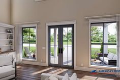 a large living room with sliding glass doors