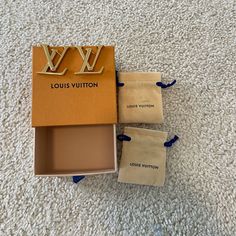 Brand New Marco Lv Earrings. Lv Initials. Height: ~1.3 Inches Weight:~0.6 Ounces. Sold Out And Hard To Find! Comes With Lv Box And Pouch Lv Earrings Louis Vuitton, Louis Vuitton Jewerly, Luxury Jewelry Box Louis Vuitton, Monogram Jewelry Louis Vuitton Official, Lv Lock Necklace, Louis Vuitton Jewelry, Gold Earrings, Initials, Pouch