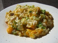 a white plate topped with macaroni and cheese