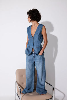 Soft Loose Denim Spring Indigo Denim Jeans, Medium Wash Denim Flare Jeans For Work, Light Indigo Denim Jeans For Fall, Fall Light Indigo Denim Jeans, Spring Workwear Light Indigo Jeans, Classic Denim Blue Denim Vest, Indigo Rigid Denim Jeans For Spring, Washed Blue Denim Jeans For Workwear, Washed Blue Denim Jeans For Work