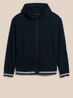 The ultimate layering piece for Summer and beyond, this elevated jacket is crafted from sumptuous, sturdy cotton jersey with graphic tipped flatknit ribbing at the bottom hem and cuffs.  RELAXED FIT: Cut with a little extra room.  Hooded collar.  Zip Winter Cotton Tops With Striped Hem, Casual Cotton Outerwear With Striped Cuffs, Stretch Cotton Athleisure Outerwear, Navy Cotton Track Jacket For Fall, Casual Cotton Track Jacket With Ribbed Cuffs, Casual Long Sleeve Track Jacket With Contrast Trim, Navy Cotton Outerwear With Ribbed Cuffs, Classic Cotton Stretch Outerwear, Cotton Track Jacket With Ribbed Cuffs Athleisure