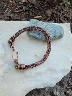 Handmade Viking Knit Bracelet with 2 different adjustable sizes to fit male or female wrist.   I made these with raw copper wire then added a patina to give them a gorgeous, rustic feel. Women's 6.5 - 8in Men's 8-9in Care Instructions: - Remove your jewelry before showering, sleeping, swimming or sweating. - Most pieces, unless otherwise specified, can be cleaned with a mild dish soap and soft toothbrush  if really necessary. Do NOT soak your jewelry or use any chemicals. - Clean your jewelry before and after each use with a soft dry polishing cloth.  >Please keep in mind when ordering that color settings on your  screen and lighting in product photography vary so the product might  differ a tad from what you see on screen. I gladly accept returns, exchanges, and cancellations! Contact me Knit Bracelet, Viking Knit, Soft Toothbrush, Wedding Jewelry Bracelets, Rustic Feel, Wedding Bracelet, Copper Wire, Cool Gifts, Vikings