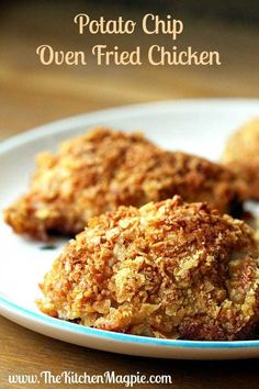 three fried chicken patties on a plate with the words potato chip oven fried chicken