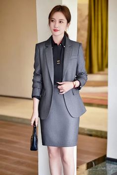 Eager to make a remarkable impression at formal events? Look no further than this two-piece set, designed from a comfortable blend of polyester and viscose. The standout feature is the blazer, boasting a chic shrug-sleeve style that adds a touch of sophistication. You have the choice to pair it with high-waisted pants for a polished look or go with a mini skirt if that's more to your liking. Click here to explore and enhance your formal attire. Specifications Brand Name: GeraldBlack Pattern Type: SolidMaterial: PolyesterMaterial: ViscoseAge: MIDDLE AGEStyle: Office LadyOrigin: Mainland ChinaCN: GuangdongSeason: Autumn/WinterElasticity: Non StrechDecoration: ButtonFabric Type: Laminated FabricMaterial Composition: Polyester 68%,Spandex 32%Pant Style: Cargo PantsFront Style: FlatFit Type: Sl Winter Business Blazer, Workwear Set With Single Button And Long Sleeves, Fitted Professional Skirt Suit For Formal Occasions, Formal Pencil Skirt Suit For Fall, Business Casual Long Sleeve Sets With Single Button, Elegant Pencil Skirt Suit For Semi-formal Occasions, Formal Fitted Solid Color Skirt Suit, Formal Fitted Solid Skirt Suit, Semi-formal Suit Collar Sets For Office