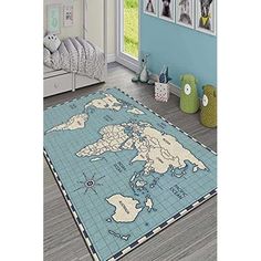 a blue rug with a world map on it in a child's room next to a window