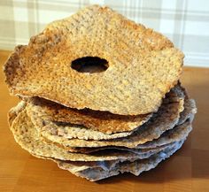 a stack of crackers sitting on top of a wooden table