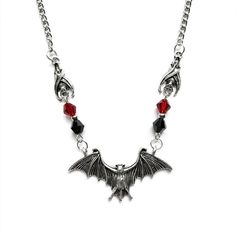 PRICES MAY VARY. Black bat necklace: This necklace is a Halloween-themed necklace. The pendant is made of flying bats, the symbol of Halloween. The two sides of the pendant are paired with red and black cubic zirconia. It has a noble temperament, and there are two guard bats with upturned wings. Let the wearer have more horror and mystery. Halloween Bat Necklace: The bat that spreads its wings is like flying. The super design makes this bat feel like it is about to come out. Wearing it on the fe Witch Accessories, Red Crystal Necklace, Bat Pendant, Bat Necklace, Spider Necklace, Lace Choker Necklace, Necklace Outfit, Bat Earrings, Halloween Necklace