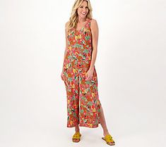 Weddings, graduations, garden parties.... You'll need a cute style to stay up to date with your full summer calendar. This Cuddl Duds Flexwear jumpsuit is just waiting in the wings to be your number one wardrobe choice. For more formal occasions, simply add some strappy heeled sandals and a pretty clutch. But this one-piece wonder is equally as stylish when paired with flats and a denim jacket. Who knew looking fabulous could be so easy? From Cuddl Duds. Summer Loungewear Jumpsuits And Rompers Overall, Summer Beachwear Jumpsuits And Rompers For Loungewear, Beachwear Jumpsuits And Rompers For Summer, Casual One-piece Jumpsuit For Spring, Summer V-neck Jumpsuits And Rompers, Spring Vacation Overall Jumpsuits And Rompers, Vacation Spring Overalls And Rompers, Spring Beachwear Overall Jumpsuits And Rompers, Summer Printed Jumpsuits And Rompers For Brunch