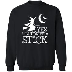 Show off your sense of humor and love for Halloween with our "Yes I Can Drive A Stick" T-shirt, sweatshirt, or hoodie. Featuring a funny witch graphic, this comfortable and stylish garment is perfect for any fall occasion. Embrace your inner witch and confidently declare your ability to drive a stick.  Product Details:   5.3-ounce, 100% cotton (99/1 cotton/poly (Ash) & 90/10 cotton/poly (Sport Grey), 50/50 cotton/poly (Dark Heather).   Heavyweight classic unisex tee.   Taped neck and shoulders; Tearaway label.   Made with sustainably & fairly grown USA cotton Spooky Black T-shirt For Winter, Funny Black Slogan Sweatshirt, Black Funny Slogan Sweatshirt, Funny Black Sweatshirt With Slogan, Funny Long Sleeve Black T-shirt, Funny Black Crew Neck Sweatshirt, Funny Black Graphic Print Sweatshirt, Black Crew Neck Sweatshirt With Funny Text, Witch Graphic