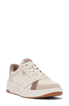 Change up your everyday ensembles with this sporty sneaker showcasing textural colorblocking and breathable mesh in the lining for comfort. Lace-up style Breathable mesh allows ventilation of excess heat for cooling comfort Leather upper/textile lining/synthetic sole Imported Casual Beige Sneakers With Removable Insole, Sporty Wedge Sneakers With Perforated Toe Box, Trendy Beige Sneakers With Perforated Toe Box, White Synthetic Sneakers With Textured Upper, Sporty Beige Platform Sneakers With Laces, Casual Cream Sneakers With Removable Insole, Sporty Beige Platform Sneakers, Sporty Neutral Sneakers For Spring, Sporty Platform Sneakers With Textured Upper For Spring