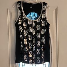 Biker's Pride Black Tank Top With Sequin Skulls - Xl. Actual Tag Fell Off, But Piece Of It Is Still There. Never Worn. Zipper Front. Silver Metallic Trim Around Arms And Neckline. Solid Black Back. Black Biker Top With Skull Print, Black Skull Print Top For Biker Events, Black Rocker Tops With Skull Print, Black Rocker Top With Skull Print, Black Rocker Style Top With Skull Print, Black Edgy Tops For Biker Events, Lady Biker, Black Tank Top, Black Back