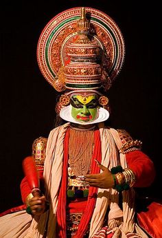 a man dressed in an elaborately decorated costume