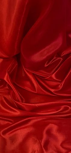 the red fabric is very soft and shiny