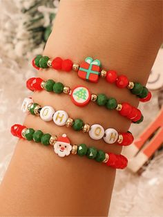 the bracelets are decorated with christmas decorations