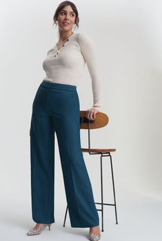 This may be our favourite wide leg ever - it looks that amazing Designed with a gorgeous texture great weight and premium waistband trim our new teal suit trouser nbsp more than worthy of a place in your wardrobe Style with a clean white shirt now and a polo neck in winterLong Tall Sally a tall womens fashions retailer where youll be sure to find the hottest new tall clothing from in sizes 8 to 32 Not only do we offer clothing that nbsp specially designed to fit but we tap into the latest trends Teal Blue Outfits For Women, Teal Pants Outfit, Womens Wide Leg Trousers, Cleaning White Shirts, Teal Suit, Teal Trim, Teal Outfits, Mother Of The Bride Suits, Tall Women Fashion