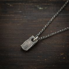 Unique Handmade Rectangular shape Sterling Silver 925 Necklace. The silver necklace was oxidized to create more antique rustic look. It is a unisex necklace so it fits both men and women. ❤ Every piece is a unique artwork carefully crafted by my own hands. Because of this, every piece is unique. So there might be slight variations in shape or color. You can choose different Silver chain length for this pendant or if you like you can choose Adjustable black cotton cord instead. ✦ Shipping: All my Oxidized Rectangular Pendant Necklace For Gifts, Oxidized Finish Necklaces With Rectangular Pendant For Gift, Oxidized Finish Rectangular Pendant Necklace As Gift, Rustic Untreated Jewelry For Gifts, Rustic Jewelry Gift, Oxidized Finish Dog Tag Jewelry For Gift, Hand Forged Rectangular Pendant Necklace As Gift, Sterling Silver Oxidized Dog Tag Jewelry, Rustic Sterling Silver Engraved Necklaces