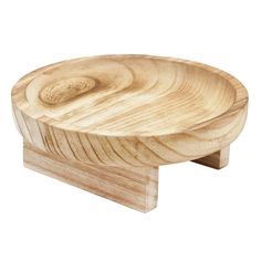 a small wooden bowl sitting on top of a stand