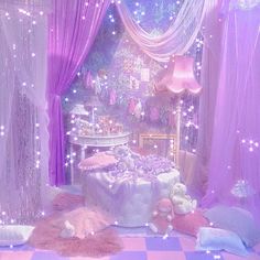 a purple and white room with teddy bears on the floor, lights in the ceiling and pink curtains