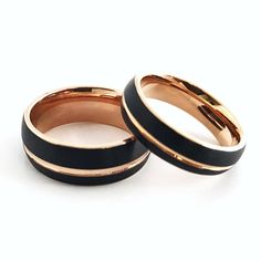 two black and rose gold wedding bands