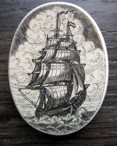 a plate with a drawing of a ship on it