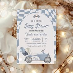 a blue and white baby shower is on display