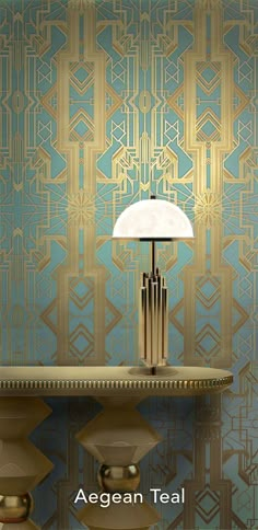 a lamp sitting on top of a table in front of a blue and gold wall