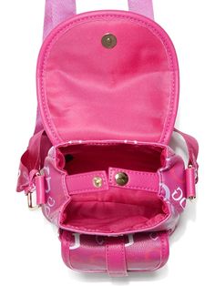 A colorful mini that's mighty cute and perfect for your Instagram feed. This pebbled faux-leather crossbody backpack features a trendy G logo print, fold-over flap, and front pocket to hold your essentials like phone and cards. The top handle and adjustable webbed strap allow carrying options to fit your outfit and adventures. At only 5 inches tall, it's small but mighty - carrying everything you need for the day in a stylish package your followers will want to like. Everyday Flap Bag With Logo, Pink Bags With Logo Strap For Everyday, Pink Everyday Bag With Logo Strap, Trendy Bags With Logo Strap, Trendy Logo Backpack Bag, Trendy Logo Backpack, Crossbody Backpack, Backpack Free, G Logo