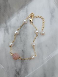 This elegant freshwater cultured Pearl Bracelet features luminous pearls and natural pink sunstone, distributed along a delicate 14k gold filled chain. The bracelet is perfect as a birthday, anniversary, bridal shower or bridesmaid's gift.  All metal components (chain, clasp, wire, beads and jump rings) are made with U.S. manufactured 14 karat gold filled material for superior durability. Please message us for custom orders - we have a wide variety of colored stones! ❂ 𝓓𝓮𝓽𝓪𝓲𝓵𝓼 → Length: 6 Minimalist Accessories Jewellery, Fresh Water Pearl Bracelet, Wire Beads, Cultured Pearl Bracelet, Wire Wrapped Jewelry Diy, Adjustable Jewelry, Colored Stones, Freshwater Pearl Bracelet, Wedding Jewelry Bracelets