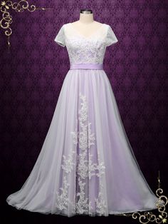 a purple dress with white lace on it