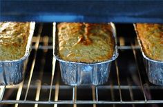 several baked goods are cooking in the oven