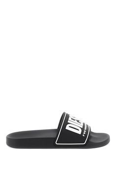 Rubber slides by Diesel with contrasting lettering logo on the band. Anatomical footbed. Size Info IT Color Detail Mixed colours Made In Italy Material 100% PU Season One fall Season Two winter Product shoes Brand Diesel Size And Fit Modern Slides With Branded Insole For Streetwear, Logo Open Toe Slides For Beach, Logo Slides For Beach With Open Toe, Casual Black Slides With Logo, Casual Slip-on Sandals With Logo, Black Logo Slides For Summer, Black Slides With Logo For Summer, Sporty Flat Slides With Branded Insole, Modern Slide Sandals For Streetwear