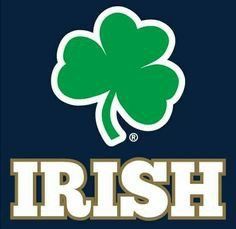 the word irish with a four leaf clover on it's side and an image of a