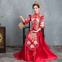 Looking a traditional Chinese bridal gown. This beautiful 2-piece qun kwa set is embroidered with gold, silver,blue and white threads. The intricate flower and peacock embroideries are decorated throughout the jacket and skirt. The peacock is a manifestation of the heavenly phoenix on earth, divinity, beauty, power, rank, and beauty. It's a perfect option for your traditional Chinese wedding, tea ceremony. Size Guide: Please refer to the size guide picture before placing the order. Please leave Traditional Embroidered Wedding Dress, Festive Wedding Dress With Gold Embroidery, Festive Gold Embroidered Dress For Wedding, Traditional Wedding Dress With Traditional Drape For Festive Occasions, Embroidered Gown For Traditional Ceremonies With Traditional Drape, Gold Gown With Pallu For Traditional Ceremonies, Traditional Floor-length Wedding Dress, Traditional Festive Wedding Dress, Traditional Gown With Floral Embroidery And Drape