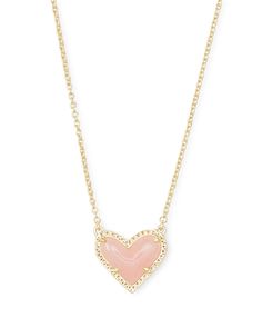 Feminine and classic with an asymmetrical design, the Ari Heart Gold Pendant Necklace in Rose Quartz is our new obsession. Layer it or let it shine on its own - either way you'll be hearing "Where'd you get that?" every time you wear this pendant necklace out. Short Pendant Necklace, Preppy Jewelry, Rose Gold Quartz, New Obsession, Kendra Scott Necklace, Let It Shine, Stone Pendant Necklace, Asymmetrical Design, Kendra Scott Jewelry