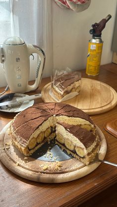 there is a cake on the table with one slice cut out and ready to be eaten