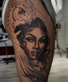 a woman with an owl on her head is depicted in this tattoo design by the artist