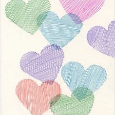 colored hearts drawn on white paper