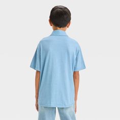 Add cool appeal to your kid's dressed-up looks with the Short-Sleeve Washed Button-Down Shirt from art class™. This solid short-sleeve shirt features a collared neckline and chest patch pocket to complete the classic look, while the front buttons add to the functional style. The single layered construction lends cool and comfy all-day wear, and the below-hip length allows for easy layering with a range of bottoms. art class™: One-of-a-kind looks for the one and only you. Blue Short Sleeve School Shirt, Casual Relaxed Fit Shirt For School, Solid Summer Shirt For School, Blue School Tops With Button Closure, Casual Blue Shirt For School, Blue School Shirt For Summer, Blue Shirt For School In Summer, Relaxed Fit Short Sleeve School Shirt, Blue Summer School Shirt